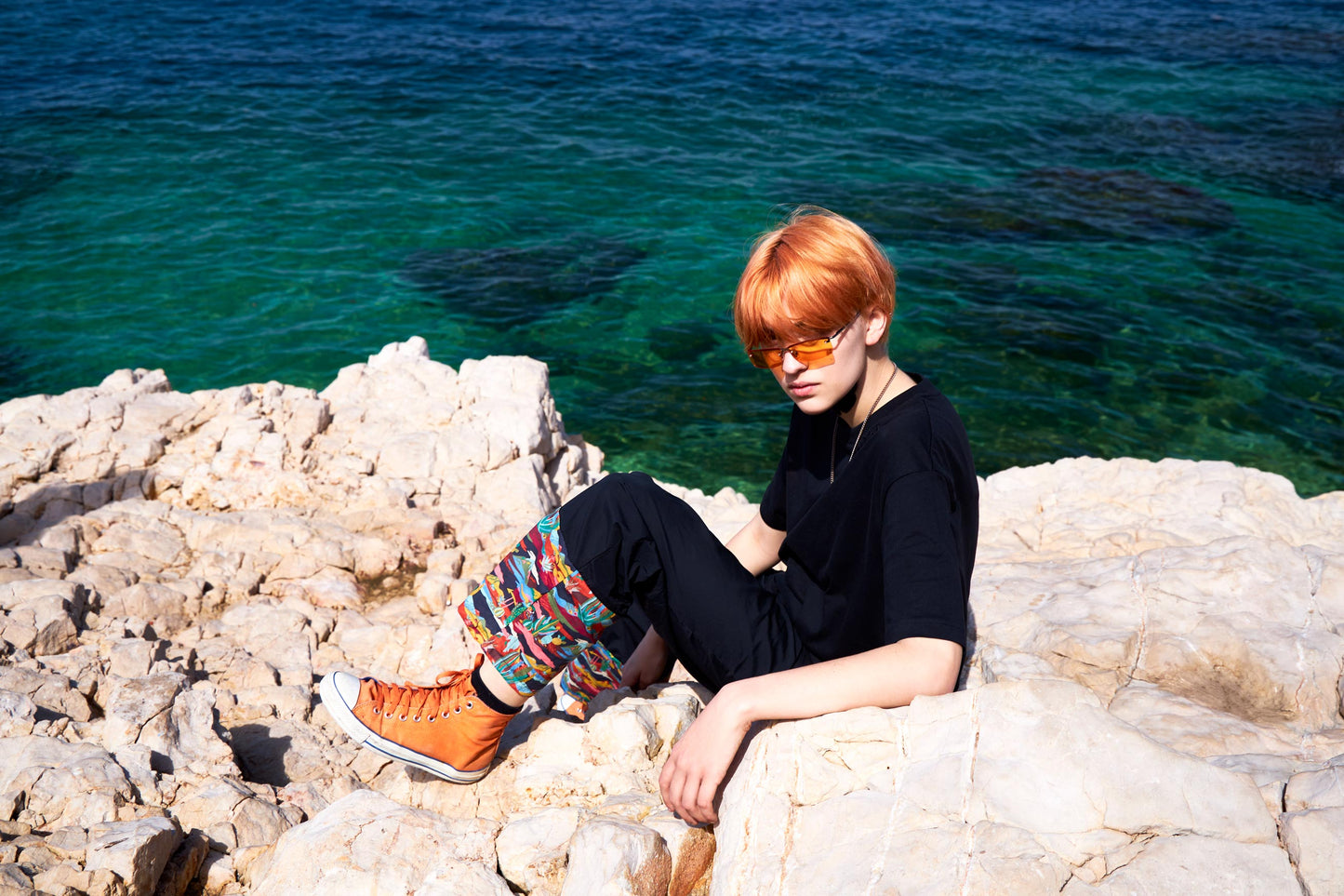 Printed black trousers upcycling sustainable fashion