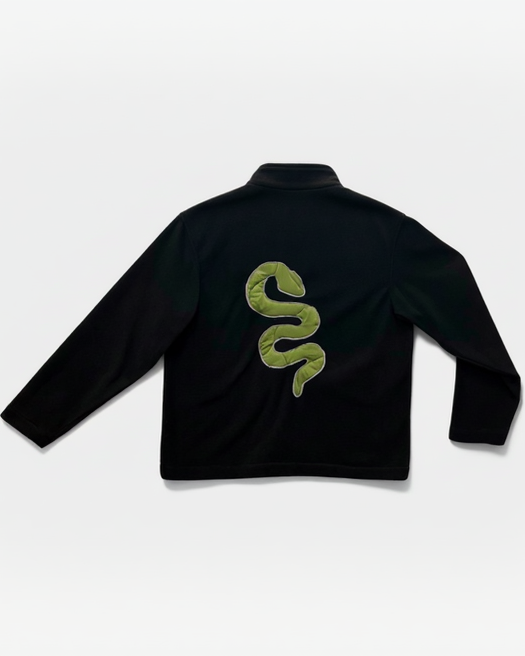 Black jacket with a green snake design on the back against sustainable MARJ
