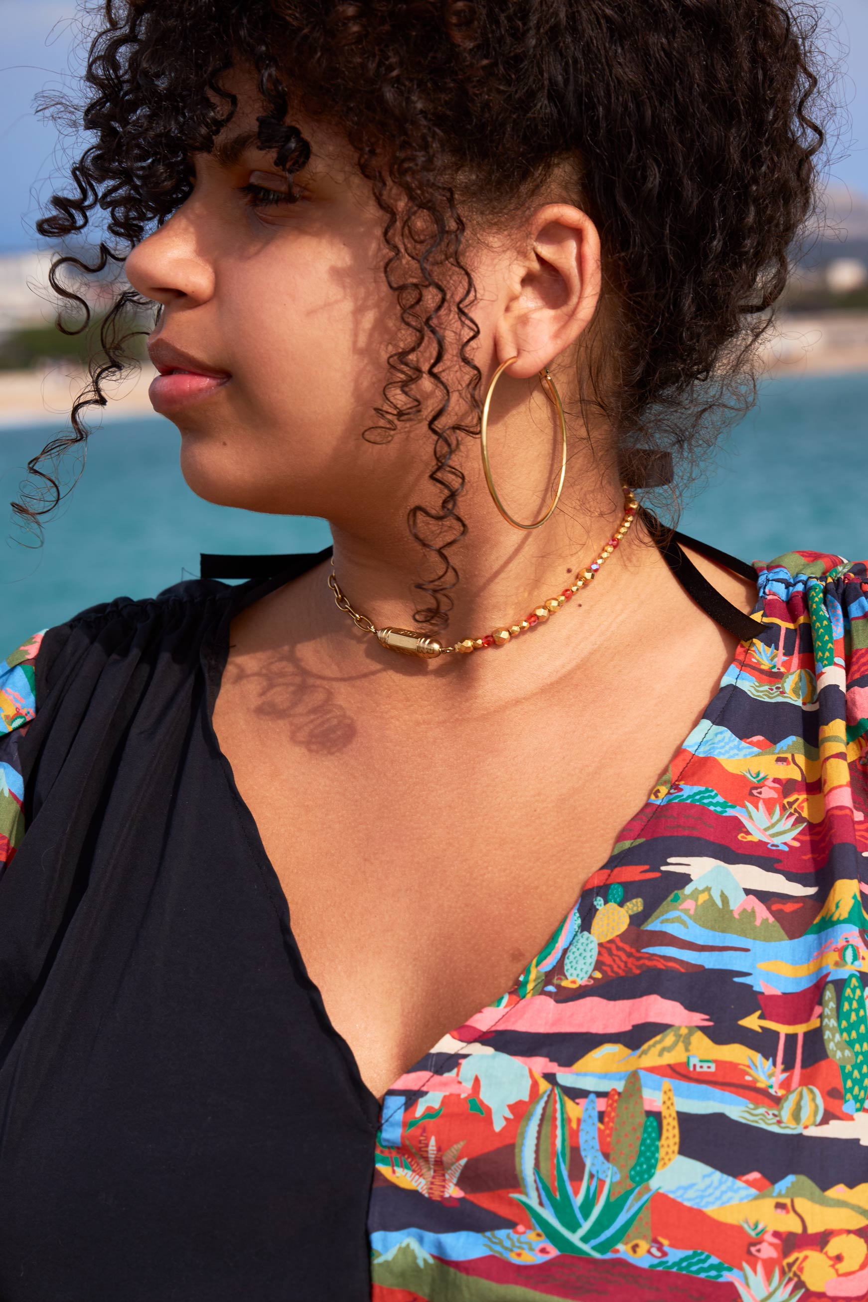 MARJ detail of V neckline top SS22 print and black slow fashion